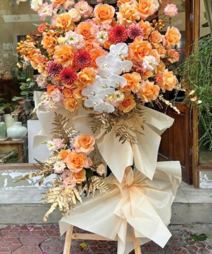 ORANGE ROSE/ORCHID GRAND OPENING FLOWER STAND